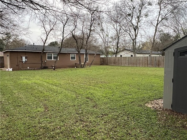 view of yard with a storage shed