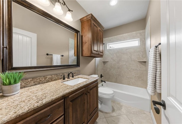 4018 Arboleda Dr, College Station, TX 77845 - bathroom with toilet, vanity, washtub / shower combination, and tile patterned flooring