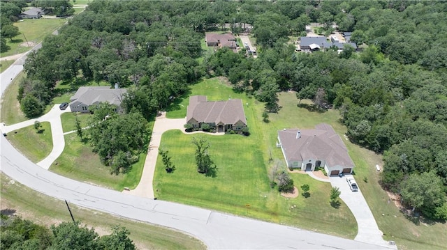 4018 Arboleda Dr, College Station, TX 77845 - aerial view of property's location with nearby suburban area and a heavily wooded area