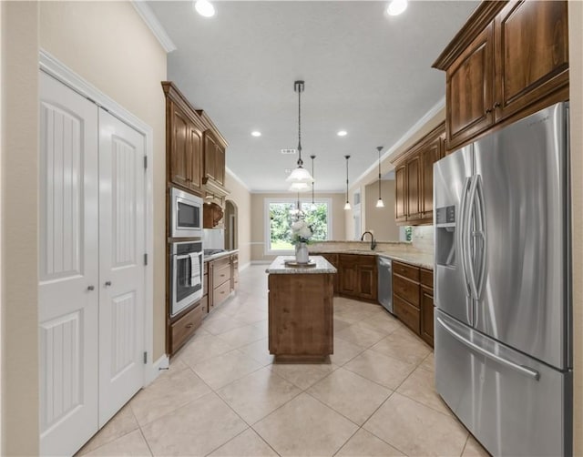4018 Arboleda Dr, College Station, TX 77845 - kitchen featuring stainless steel appliances, crown molding, tasteful backsplash, light stone counters, and recessed lighting