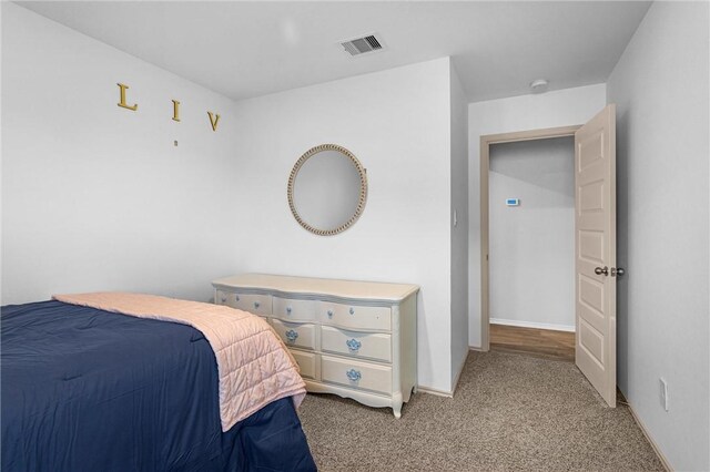 1147 Buffalograss Trl, Sealy, TX 77474 - carpeted bedroom featuring baseboards