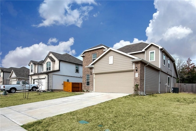 5759 Cerrillos Dr, Bryan, TX 77807 - traditional home featuring driveway, brick siding, central AC, and an attached garage