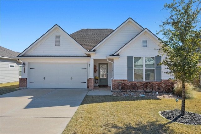 craftsman-style house with a garage and a front lawn