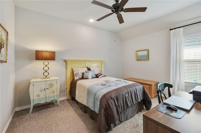 carpeted bedroom featuring vaulted ceiling and ceiling fan