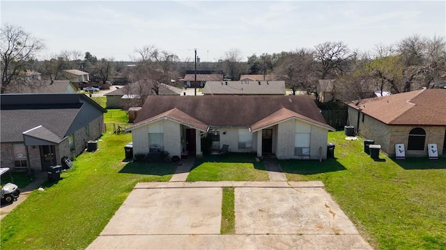 birds eye view of property with a residential view