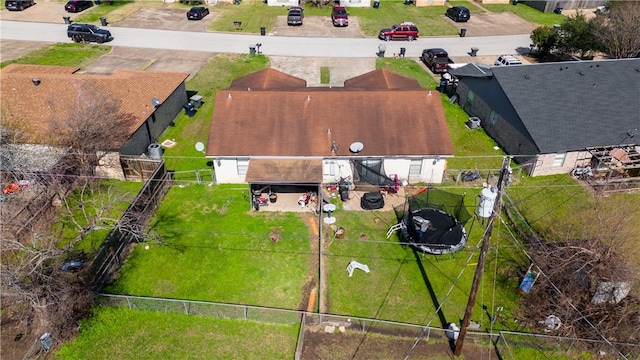 birds eye view of property with a residential view