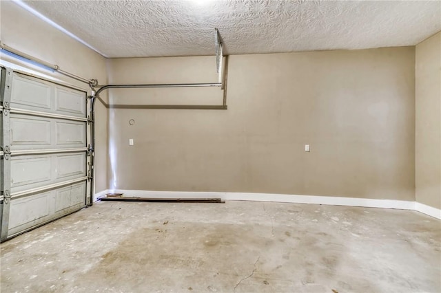 garage with baseboards