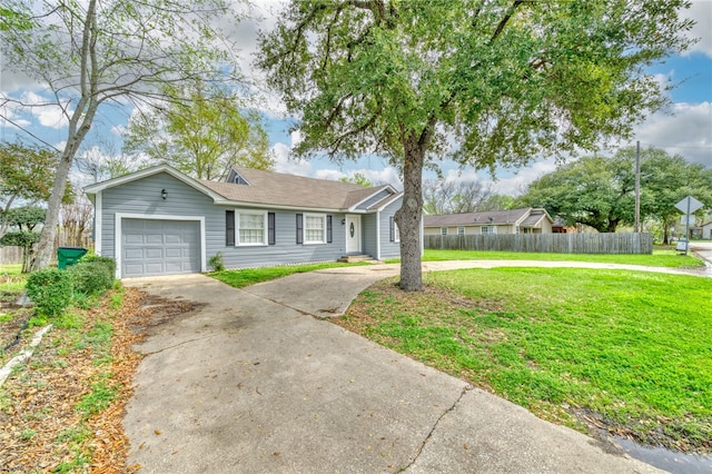 view of front of house with concrete driveway, a garage, fence, and a front lawn