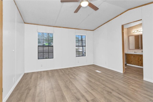 SPLITA4794 Tall Pine Rd, Navasota, TX 77868 - spare room with lofted ceiling, wood finished floors, a ceiling fan, and crown molding