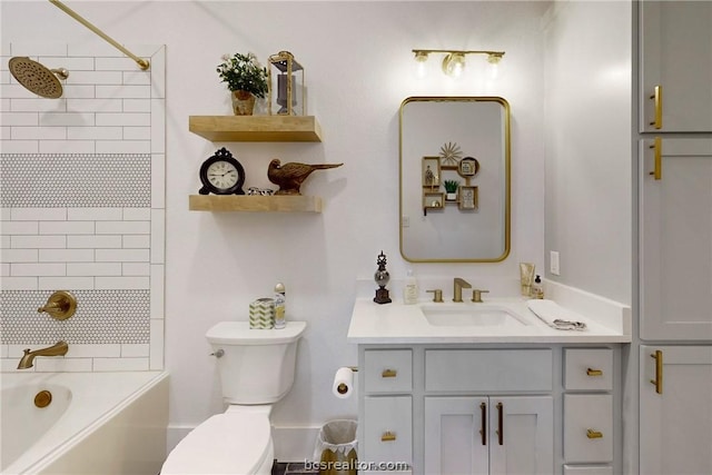 full bathroom featuring vanity, toilet, and tiled shower / bath combo