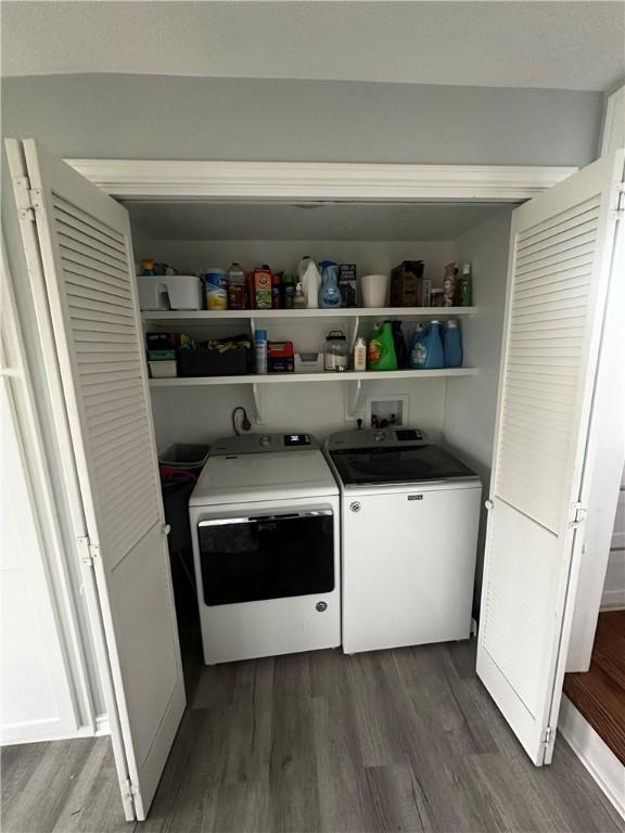 306 Timber St, College Station, TX 77840 - laundry area featuring washing machine and clothes dryer and dark wood finished floors