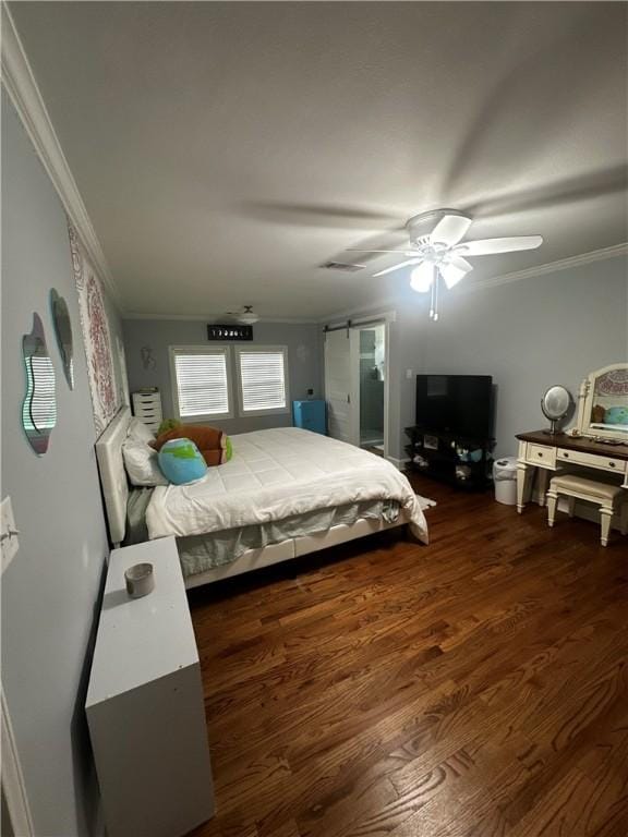 306 Timber St, College Station, TX 77840 - bedroom with ornamental molding, wood finished floors, and ceiling fan