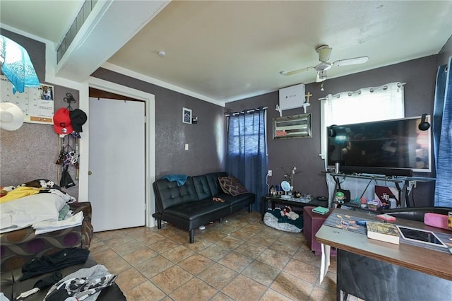 living area featuring ceiling fan