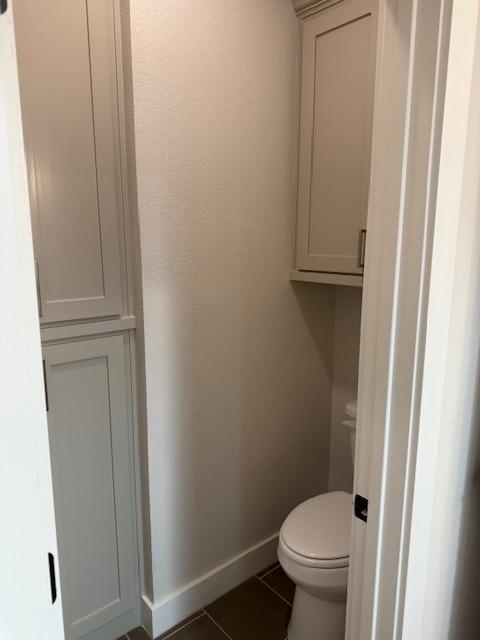 2913 Bombay Ct, Bryan, TX 77808 - bathroom featuring tile patterned flooring and toilet