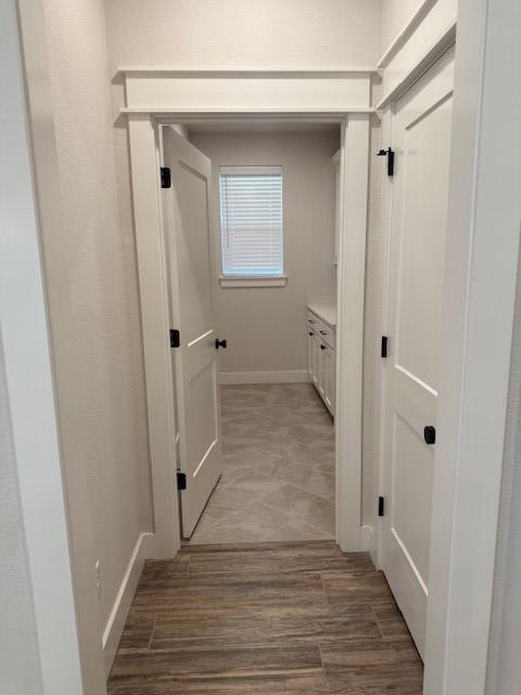 2913 Bombay Ct, Bryan, TX 77808 - hall featuring baseboards