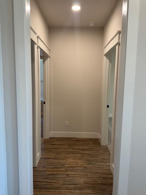 2913 Bombay Ct, Bryan, TX 77808 - hall featuring dark wood-type flooring and recessed lighting