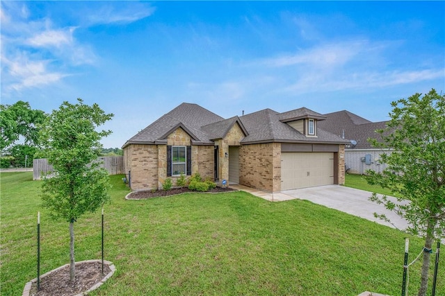 view of front of home with fence, concrete driveway, a garage, and brick siding