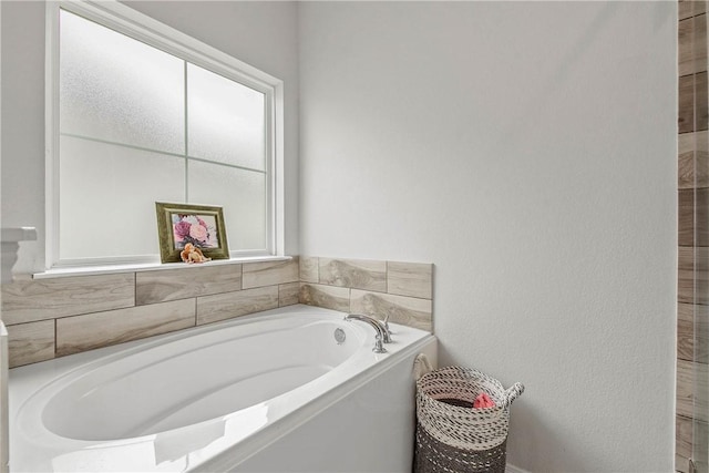 full bathroom with a garden tub