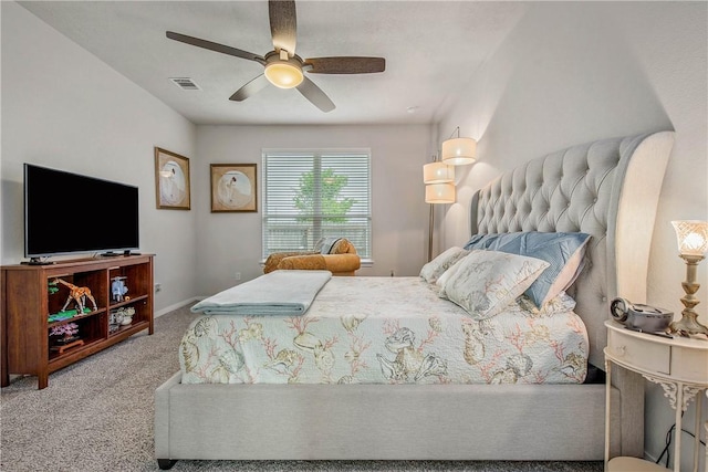 bedroom with carpet flooring, ceiling fan, visible vents, and baseboards