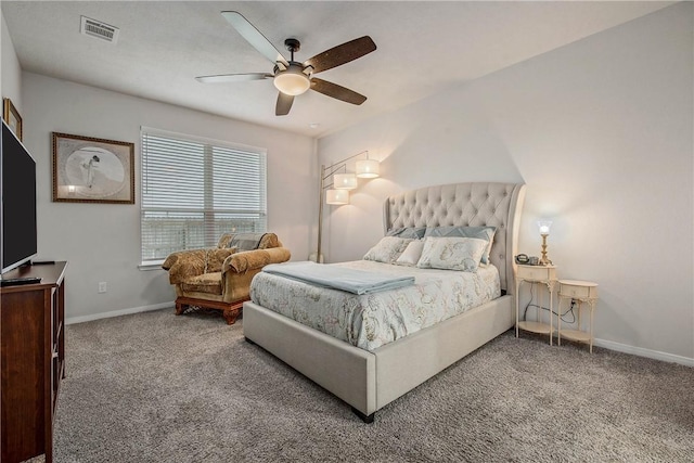 bedroom featuring baseboards, carpet, a ceiling fan, and visible vents