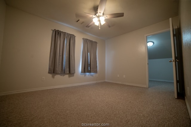 carpeted empty room featuring ceiling fan