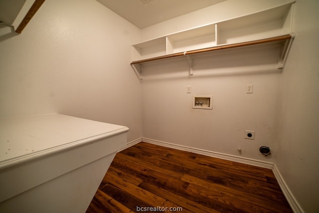 laundry room with hookup for a washing machine, dark wood-type flooring, hookup for a gas dryer, and electric dryer hookup