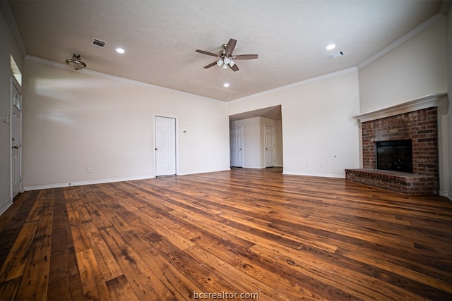 unfurnished living room with ceiling fan, a fireplace, dark hardwood / wood-style floors, and ornamental molding