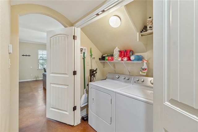 laundry room with washing machine and dryer