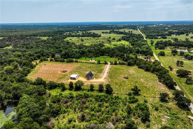 birds eye view of property featuring a rural view