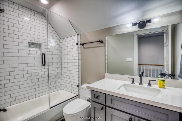 full bathroom featuring vanity, lofted ceiling, toilet, enclosed tub / shower combo, and a textured ceiling