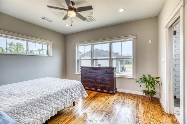 bedroom featuring ceiling fan and light wood-type flooring