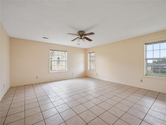 17645 Hwy 6, Navasota, TX 77868 - spare room with a ceiling fan and light tile patterned floors
