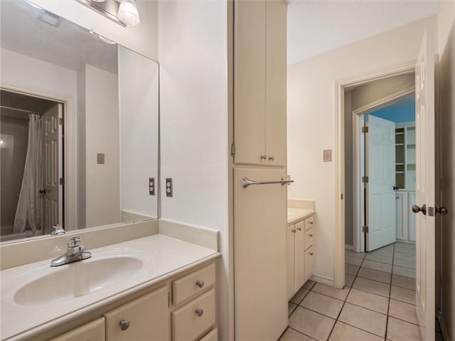 17645 Hwy 6, Navasota, TX 77868 - bathroom featuring vanity, tile patterned flooring, and a shower with curtain