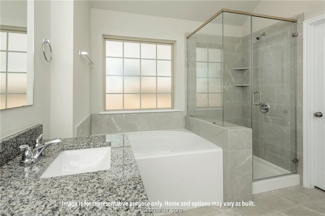 bathroom with tile patterned flooring, separate shower and tub, a wealth of natural light, and sink