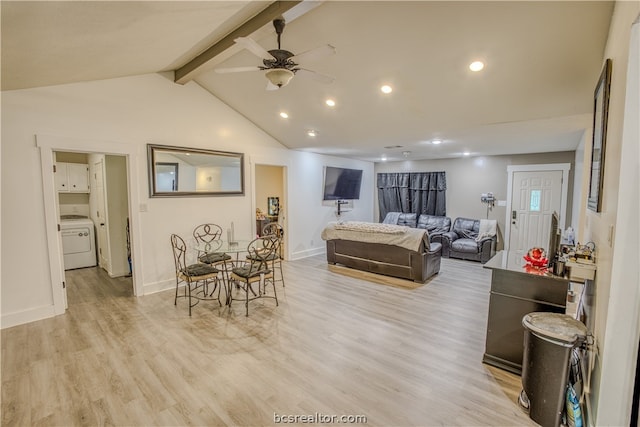 living room with vaulted ceiling with beams, ceiling fan, light wood-type flooring, and washer / dryer