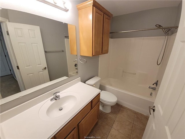 full bathroom featuring tile patterned flooring,  shower combination, vanity, and toilet