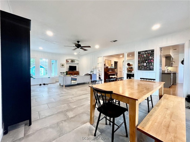 dining room featuring ceiling fan