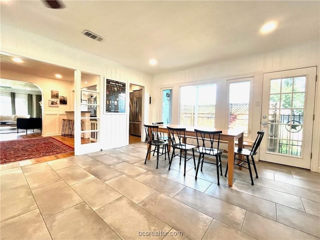 dining room featuring plenty of natural light