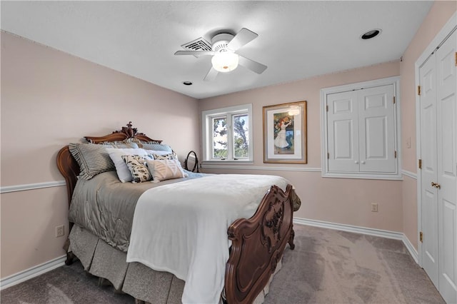 bedroom featuring carpet, baseboards, and a ceiling fan