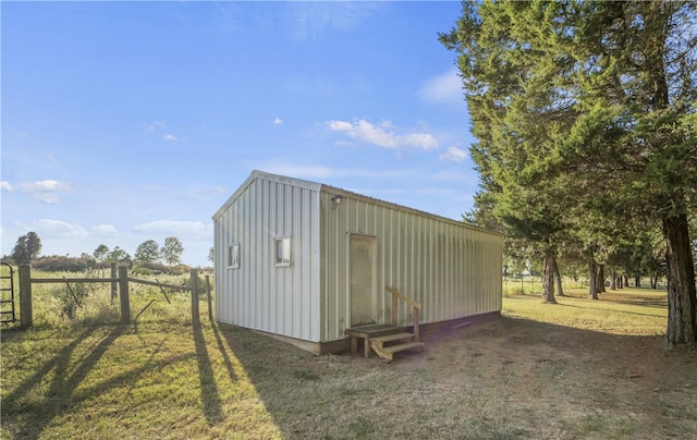 view of outbuilding with a rural view