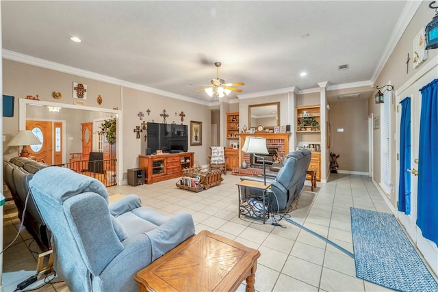 tiled living room featuring ceiling fan and crown molding