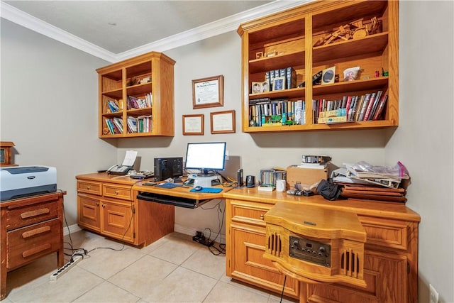 tiled office space featuring built in desk and ornamental molding