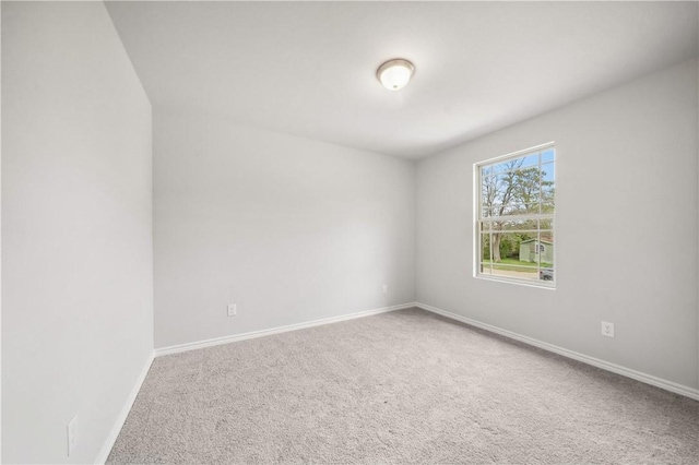 empty room featuring carpet floors