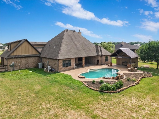 5398 Prairie Dawn Trl, College Station, TX 77845 - outdoor pool featuring a lawn, central air condition unit, a patio area, and an outdoor fire pit