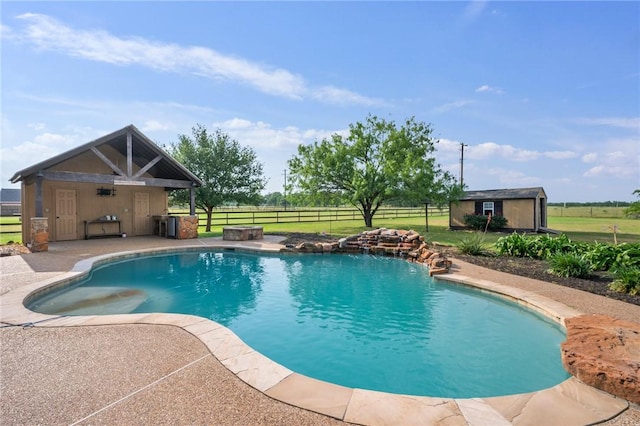 5398 Prairie Dawn Trl, College Station, TX 77845 - pool featuring an outdoor structure, a fenced backyard, a yard, and a patio