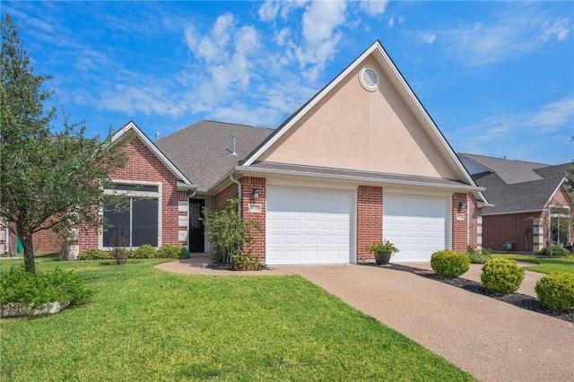 view of front of home featuring a garage and a front lawn