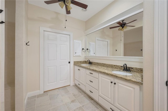 bathroom featuring vanity and ceiling fan