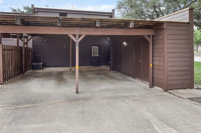 1538 Wolf Run, College Station, TX 77840 - garage with a carport and driveway