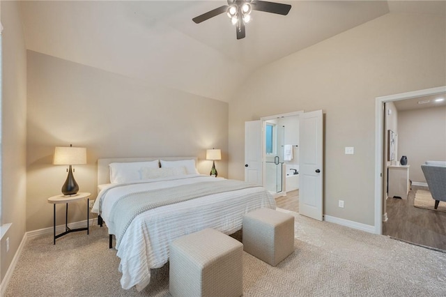 carpeted bedroom with ceiling fan and lofted ceiling