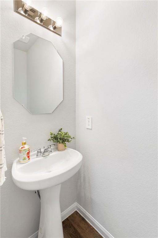 bathroom featuring hardwood / wood-style flooring